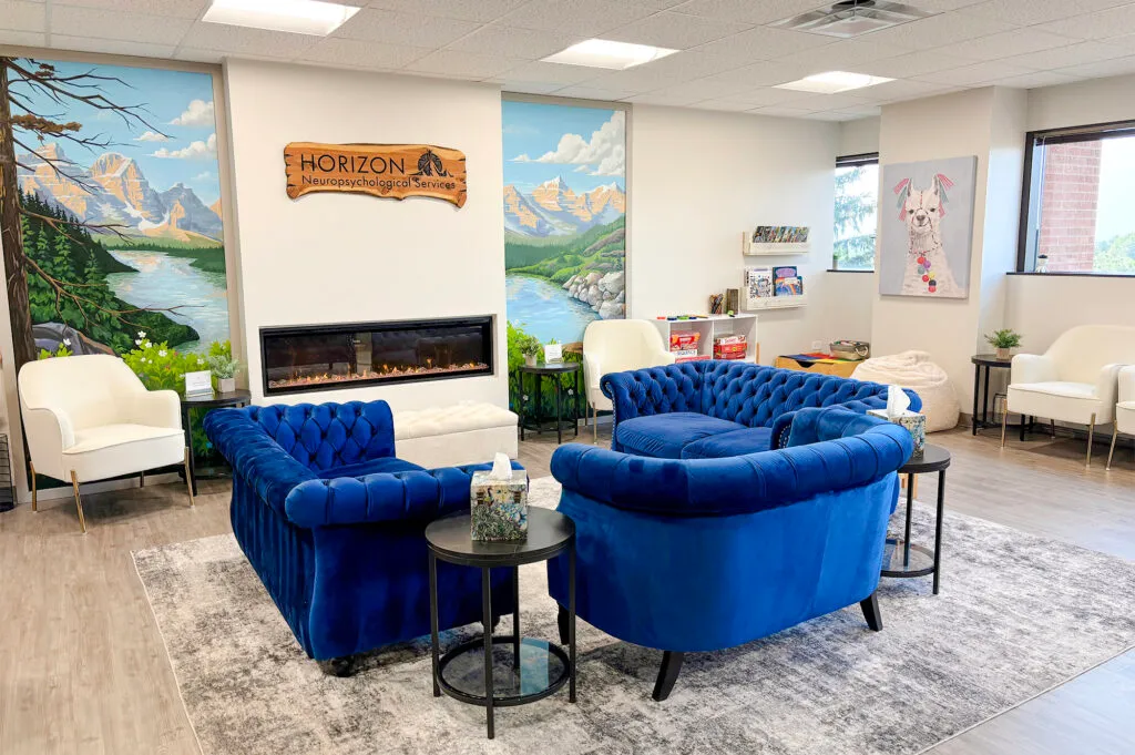 Littleton office waiting room with fireplace