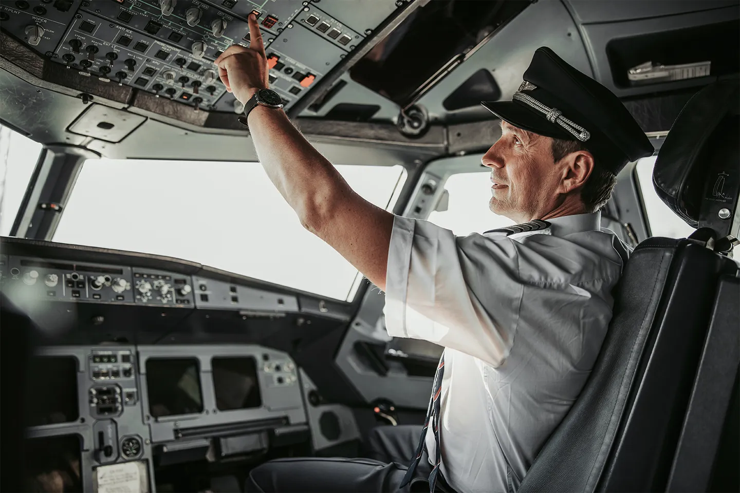 Pilot in aircraft cockpit during FAA evaluation hero section